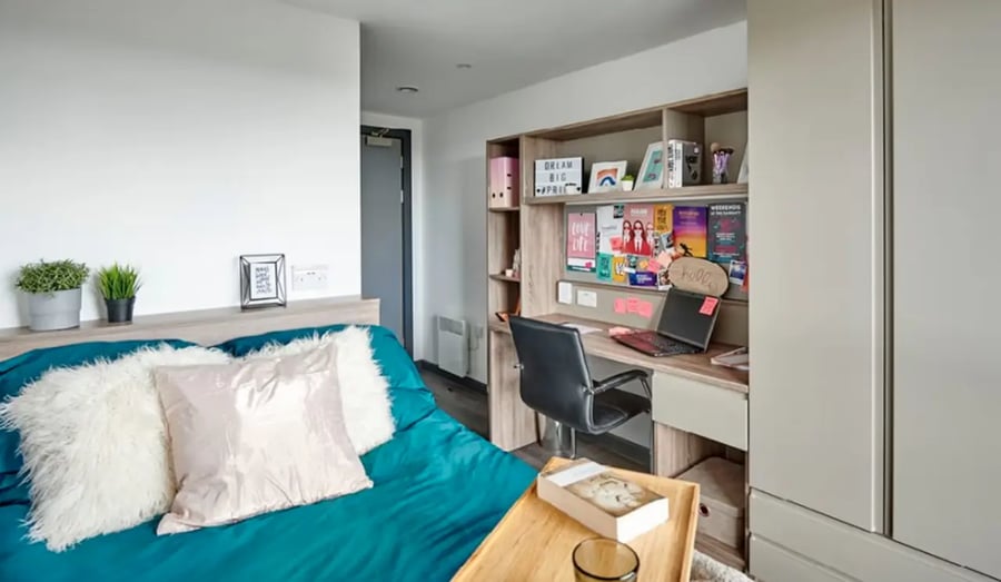 Bed study area with desk and laptop Bedroom at Trinity View Coventry in Coventry Student Accommodation